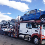 Cars being shipped by a courier