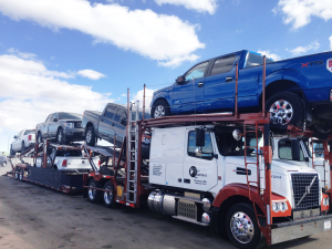 Cars being shipped by a courier